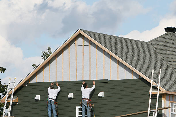 Professional Siding Installation technician working in Fredericksburg, PA